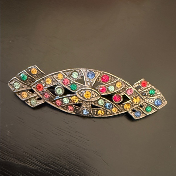 Jewelry - vintage Art Deco style brooch featuring colorful rhinestones in a pot metal base